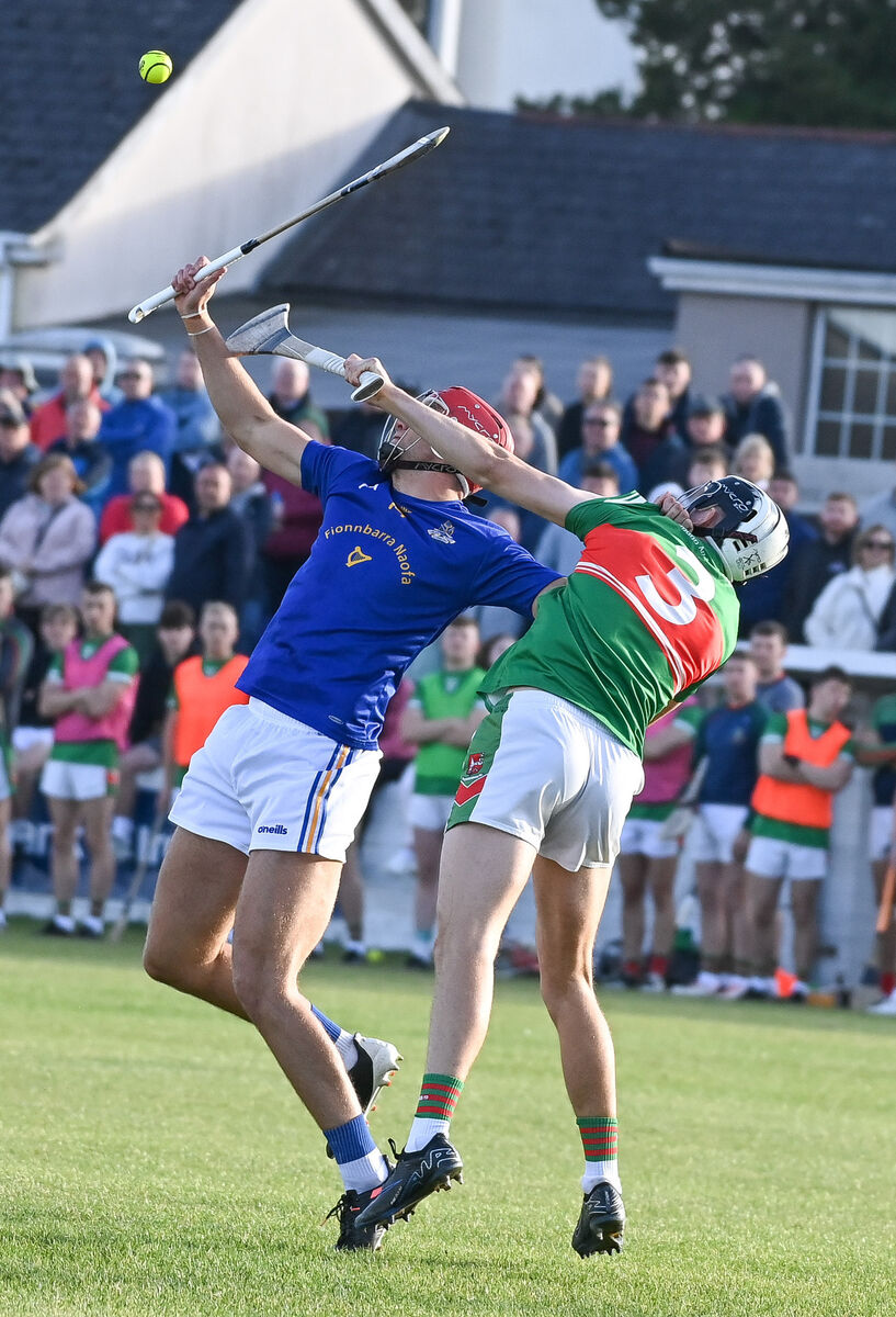 St Finbarr’s Brian Hayes and Fr O’Neill’s Ger Millerick compete for a dropping ball. Picture: David Keane. St Finbarr’s Brian Hayes and Fr O’Neill’s Ger Millerick compete for a dropping ball. Picture: David Keane.