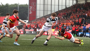 <p>CLINICAL: PBC’s Daniel Murphy evades the tackle of Donal Barry of CBC to score a try. Picture: INPHO/Bryan Keane</p>
