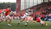 Daniel Murphy evades the tackle of Donal Barry to score a try 26/2/2026