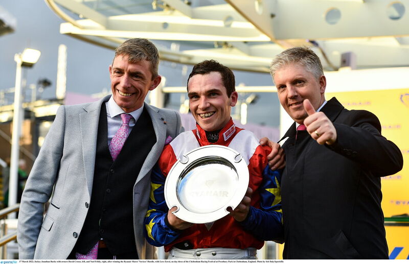 Jockey Jonathan Burke with owners David Crosse, left, and Noel Fehily, right, after winning the Ryanair Mares' Novices' Hurdle with Love Envoi in 2022. Picture: Seb Daly/Sportsfile Jockey Jonathan Burke with owners David Crosse, left, and Noel Fehily, right, after winning the Ryanair Mares' Novices' Hurdle with Love Envoi in 2022. Picture: Seb Daly/Sportsfile