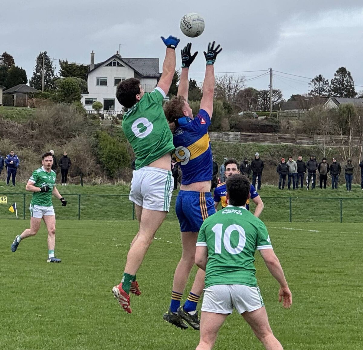 Ballincollig's Sean Dore and Carrigaline's Pa Mellett contest the high ball.
