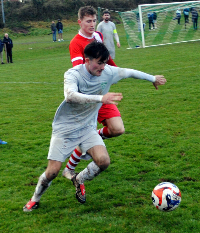 Coachford's Cialan O'Sullivan in action against Regency FC at the Glebe over the weekend. Picture: Barry Peelo.