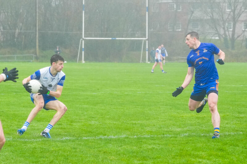 Killian Cronon of Knocknagree takes on the Barrs' Alan O'Connor. Picture: Noel Sweeney