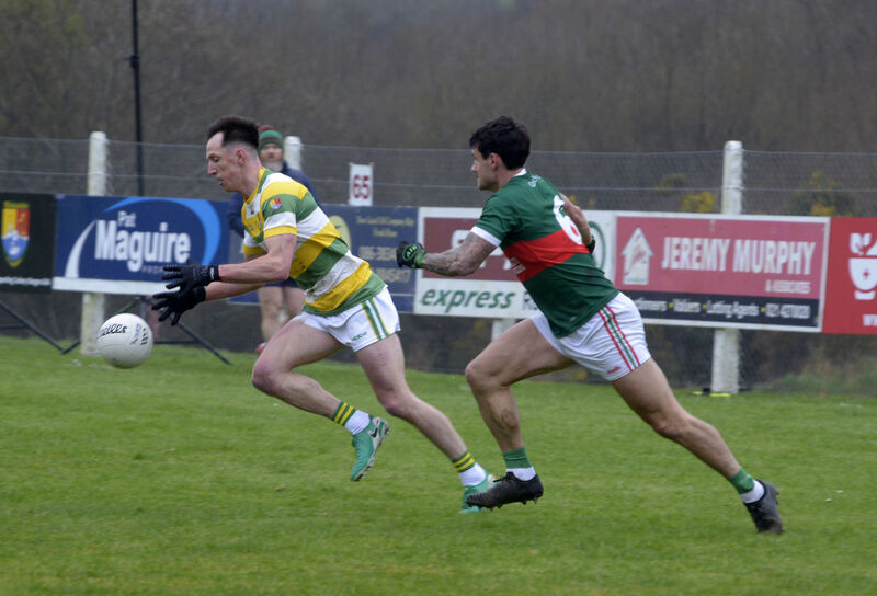 Carberys Rangers' Brian Hodnett on the move from Clonakilty's Thomas Clancy. Picture: Denis Boyle
