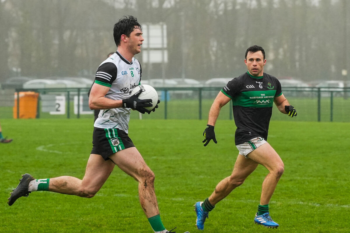 Nemo Rangers' Stephen Cronin closes in on Shane Ahern of Douglas. Picture: Noel Sweeney