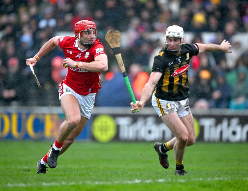 Brian Hayes of Cork is tackled by Mikey Carey of Kilkenny. Picture: Ray McManus/Sportsfile