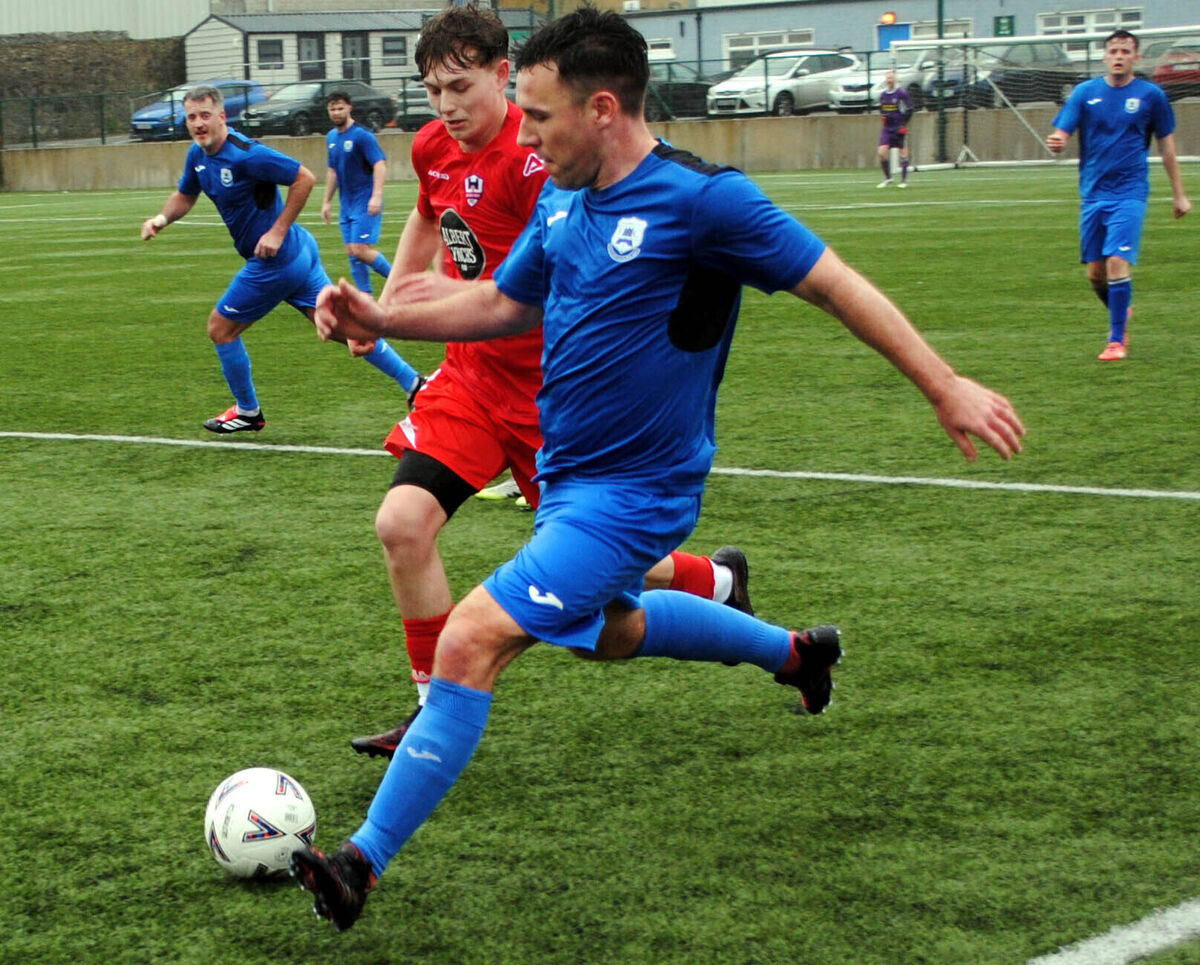 Castlebridge Celtic's David Twomey comes away with possession as Mallow Town's Ryan O'Sullivan closes in. Picture: Barry Peelo. Castlebridge Celtic's David Twomey comes away with possession as Mallow Town's Ryan O'Sullivan closes in. Picture: Barry Peelo.