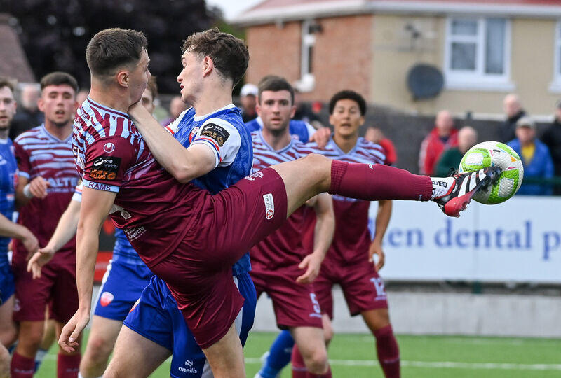  Cobh Ramblers' Cian Coleman tussles with Treaty United's Robbie Lynch. Picture: David Keane