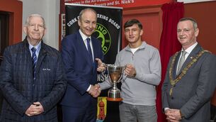 <p>An Taoiseach, Micheál Martin, presenting the Paddy 'The Champ' Martin Cup to Kuba Pielesz of Golden Gloves BC. Also included are Lord Mayor Fergal Dennehy and President of the Cork County Boxing Board Michael O’Brien. Picture: Doug Minihane</p>