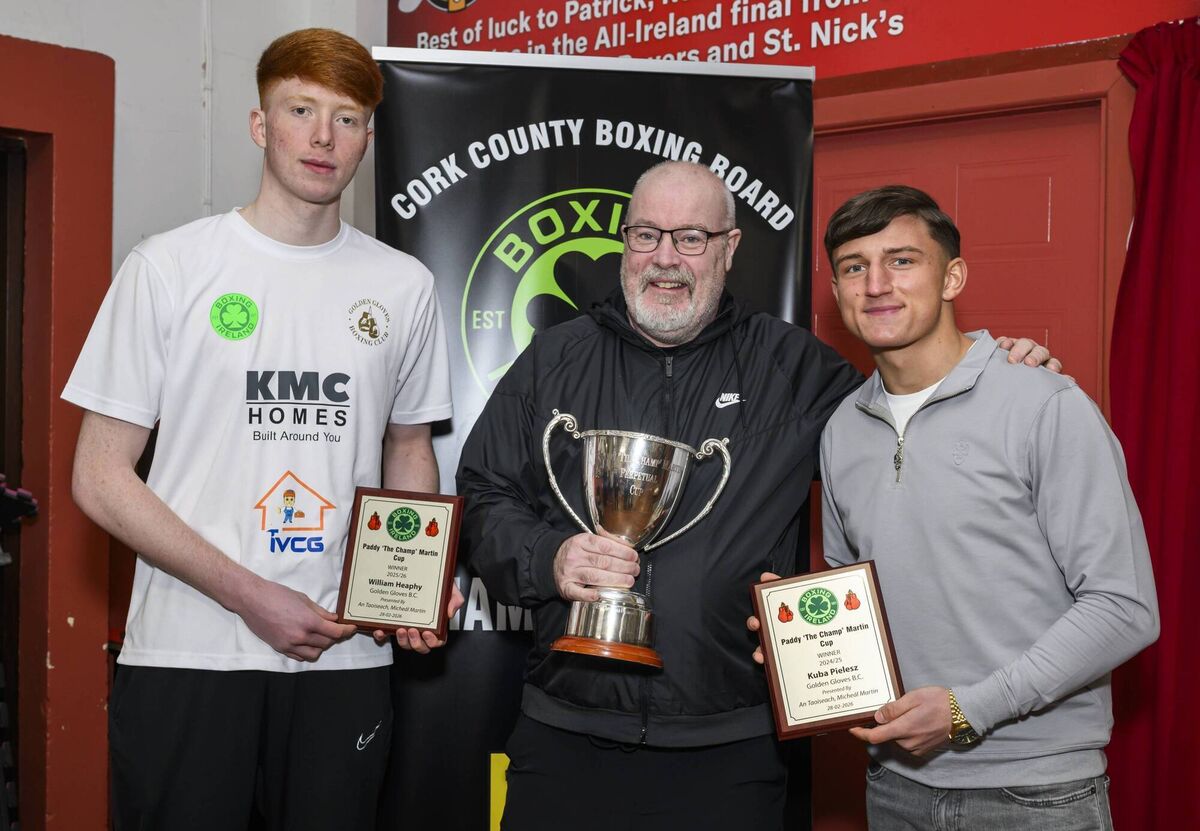 Proud Golden Gloves BC Head Coach John Morrissey pictured with his Paddy 'The Champ' Martin Cup winners William Heaphy and Kuba Pielesz after the presententations at the Glen BC premises in Blackpool on Saturday 28th of February. Picture: Doug Minihane