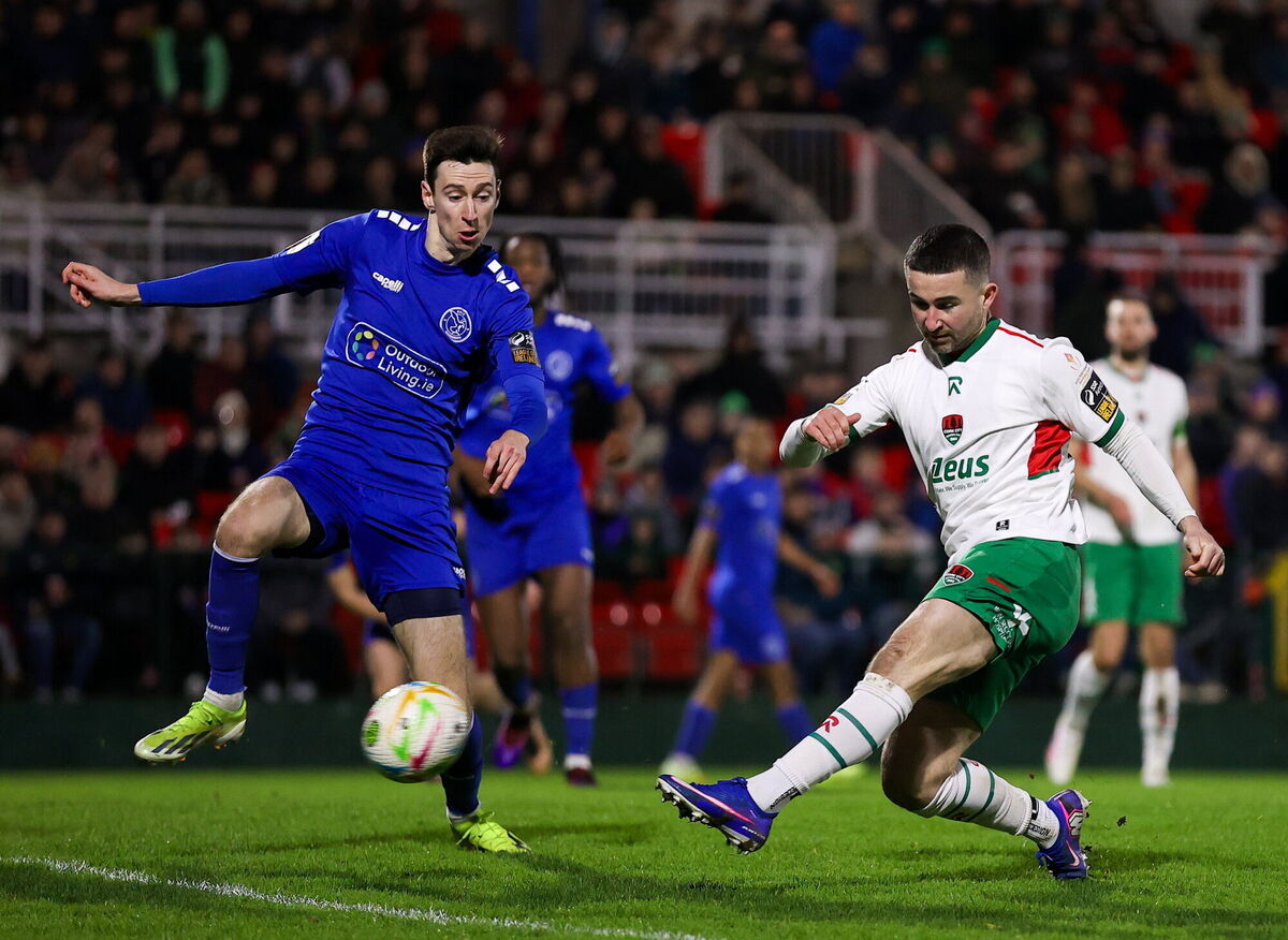 Seani Maguire of Cork City has a shot on goal despite the attention of Kyle Tucker of Bray Wanderers during the SSE Airtricity Men's First Division match. Picture: Michael P Ryan/Sportsfile