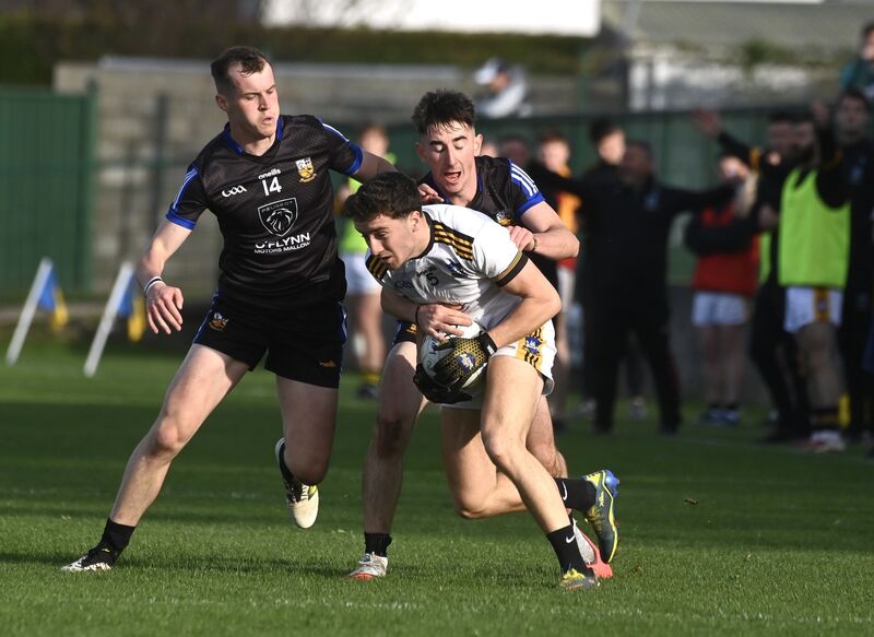  Michael O’Neill and Aaron Trimm, Buttevant keep the pressure on Conor Dodd, Canovee in the McCarthy Insurance Group PJFC SF Buttevant vs Canovee in Glantane. Picture: Larry Cummins
