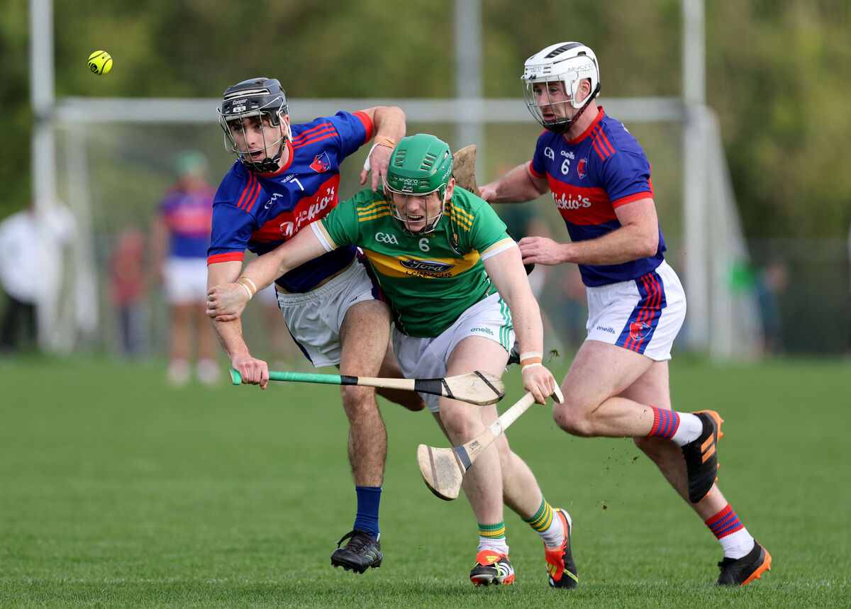  Cormac McDonnell and Shane Broderick of Erin's Own battle with Newtownshandrum's Cormac O'Brien in last year's relegation play-off. Picture: Jim Coughlan