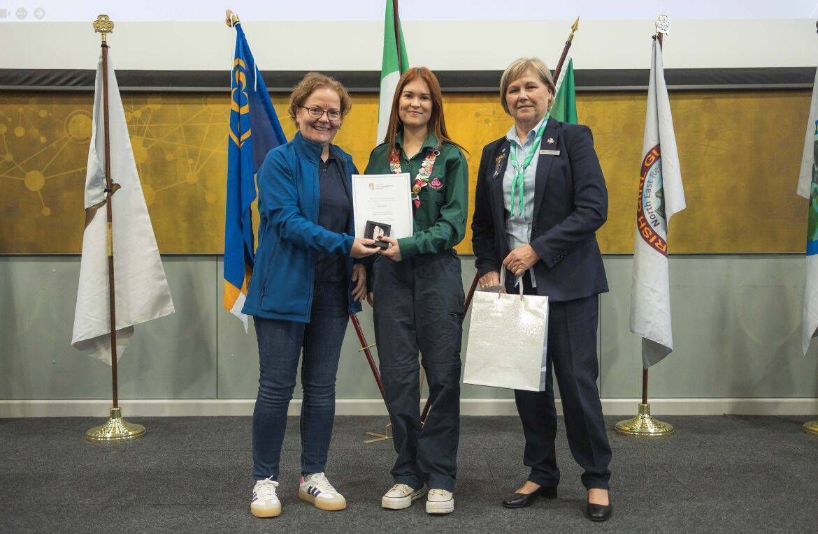 Katie being re-presented with her Silver Gaisce Award by Gaisce CEO, Avril Ryan and President of Irish Girl Guides, Deirdre Henley