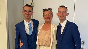 <p>Sinead McGrath with her 23-year-old twin sons Lee and Alex, both of whom have intellectual disabilities.</p>