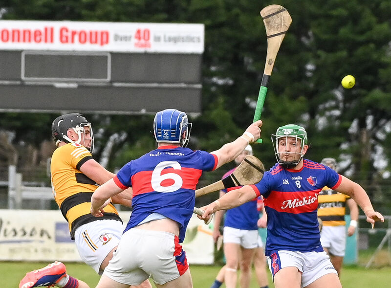  Daire Connery of Na Piarsaigh shoots under pressure from Barry Óg Murphy and Cian Dunphy of Erins Own. Picture: David Keane