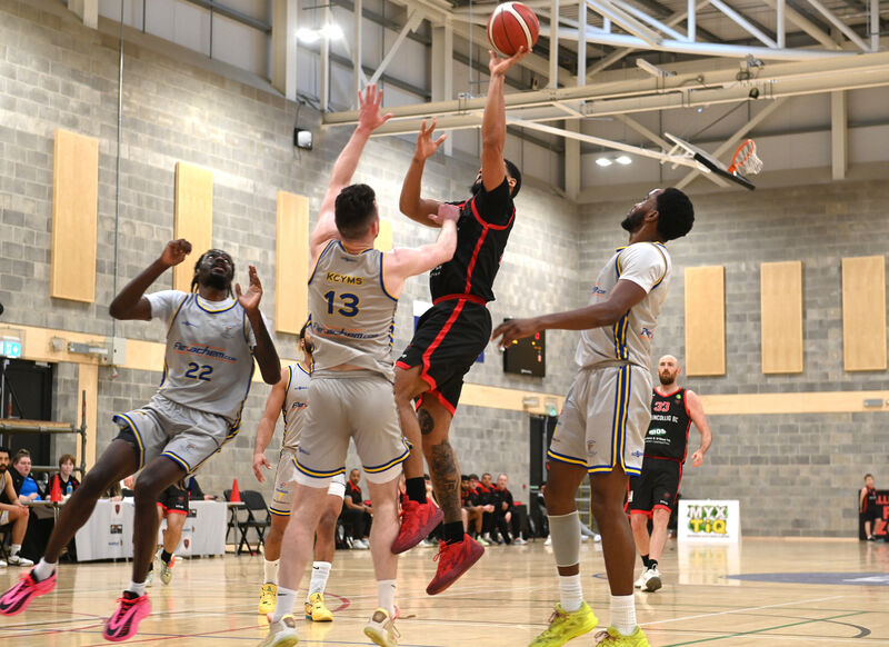  Latavious Mitchell scores a basket for Ballincollig against KCYMS. Picture: Larry Cummins