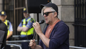 <p>Cork-based singer-songwriter Martin Leahy marking performing 'Everyone Deserves a Home' outside Leinster House. File picture: Sam Boal/Collins</p>
