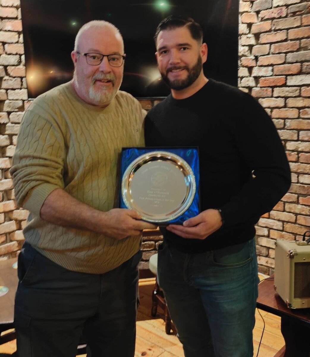 Cork Boxing: John Morrissey, head doach Golden Gloves Boxing Club, presenting Tom O'Donnell, Charleville Boxing Club, with the Cork Coach of the Year.