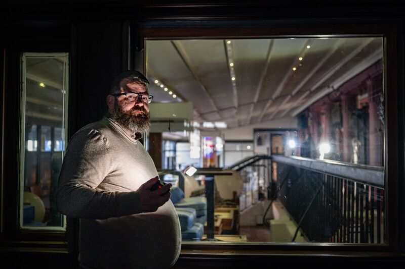Paul O’Dea oversees courtyard renovations from a snug at the South Gate Bar, where restoration work highlights the original woodwork of the former Flying Enterprise Complex. Picture: Chani Anderson