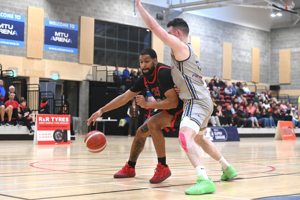  Jordan Blount, KCYMS,  defends against Latavious Mitchell, Ballincollig, at MTU Arena. Picture: Larry Cummins