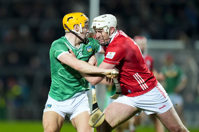 Tim O’Mahony of Cork and Adam English of Limerick battling hard on Saturday night. Picture: INPHO/James Lawlor