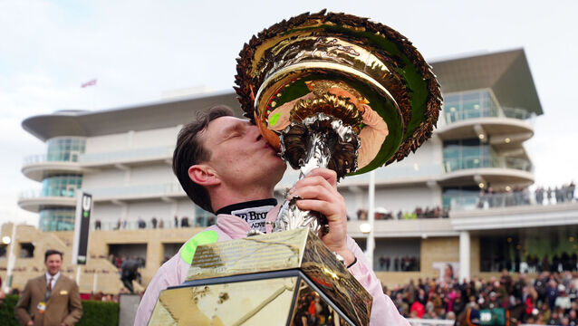 <p>Paul Townend with the Unibet Champion Hurdle trophy following his victory aboard Lossiemouth on day one of the 2026 Cheltenham Festival at Cheltenham Racecourse.</p>