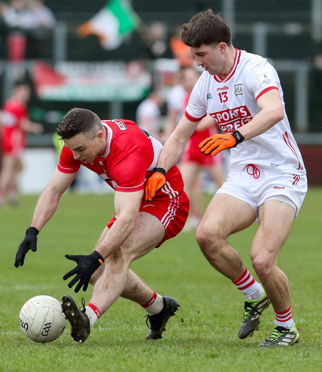 Derry’s Niall Toner and Cork’s Chris Óg Jones. Picture:  INPHO/Lorcan Doherty