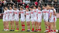 The Cork team during the minutes silence before the game 1/3/2026