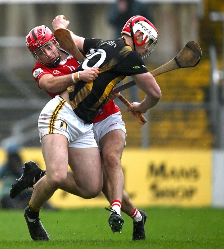 Liam Moore of Kilkenny is tackled by William Buckley of Cork. Picure: Ray McManus/Sportsfile