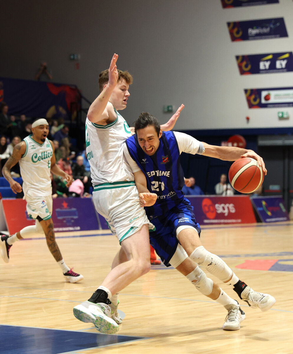  Nil Sabata, Neptune, battles Philip Kearney, Limerick Celtics. Picture: Jim Coughlan.